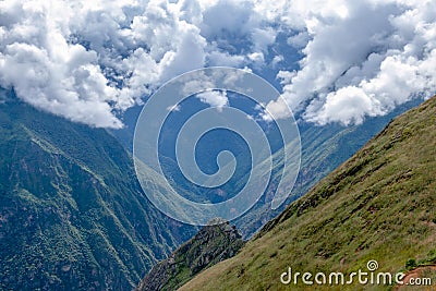 Blurred background with the cloud-covered mountain peaks of Apurimac river valley, Peru Stock Photo