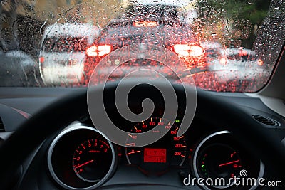 Blurred background with Modern Car dashboard modern automobile control illuminated panel.Car Driving. Vehicle Steering Wheel Stock Photo