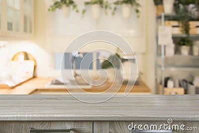 Blurred background. Modern defocused pastel kitchen with wooden tabletop and space for you. Stock Photo