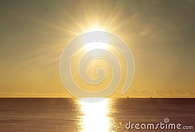 Blurred background. Sun shining in sky during sunset dawn. Sunrise dawning Stock Photo