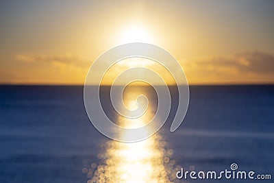 Blurred background. Sun shining in sky during sunset dawn. Sunrise dawning Stock Photo