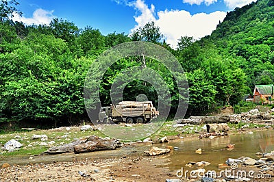 Blurred banks of a mountain river Editorial Stock Photo
