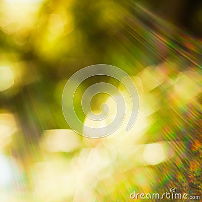 Blurred bokeh background with solar glow spectrum of rays in all shades Stock Photo