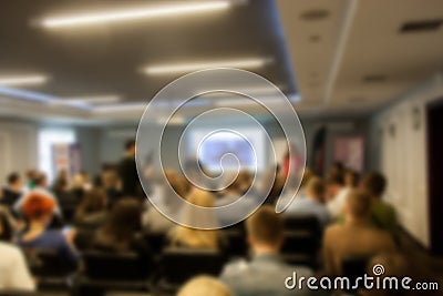 Blurred business seminar meeting in the conference hall. Defocused people Stock Photo