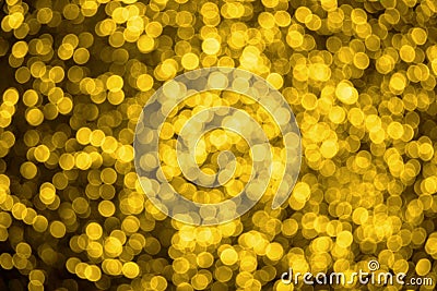 Blurred Christmas and New Year background with shiny gold stars Stock Photo