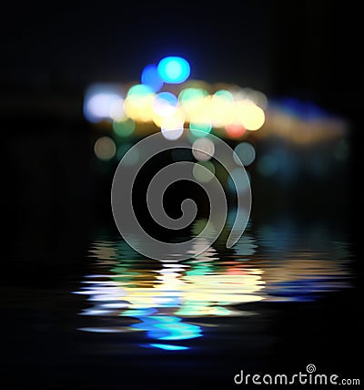 Blurred city at night, bokeh background. Stock Photo