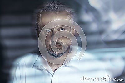 Blurred close-up of a troubled middle-aged man`s face with eyes Stock Photo