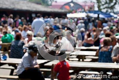 Blurred crowd at local market Stock Photo