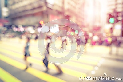 Blurred defocused abstract background of people walking on street Stock Photo