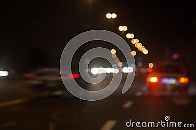 Blurred defocused lights of traffic in the city Stock Photo