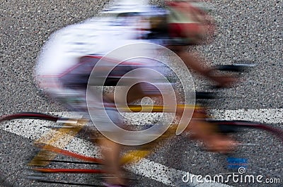 Blurred female road cyclist Stock Photo
