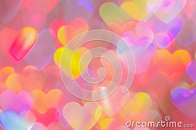 blurred heart shaped holographic bokeh lights background Stock Photo