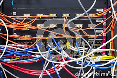 Blurred image Cable management inserver room A bad case of cable spaghetti, The worst cable mess Stock Photo