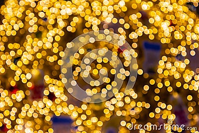 Blurred image Decorative outdoor string lights hanging in the garden at night time Stock Photo