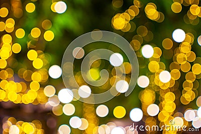 Blurred image Decorative outdoor string lights hanging on tree in the garden at night time Stock Photo