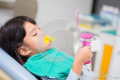 Blurred image The Fluoride coating in children Stock Photo