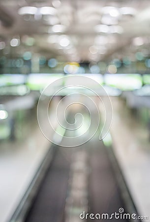 Blurred image of moving modern escalator way in the airport hall Stock Photo