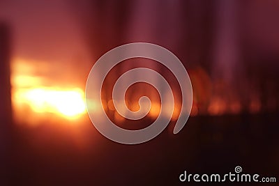 Blurred lilac, orange magenta background with lights and highlights, concept of optical illusions, halo Stock Photo