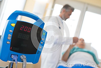 Blurred - male doctor take care patient in hospital Stock Photo