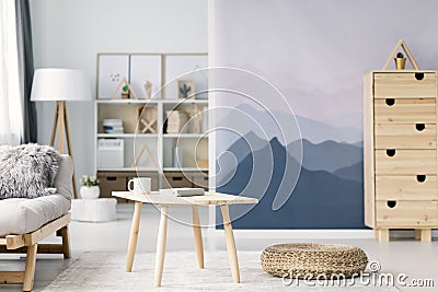 Wooden table and pouf Stock Photo