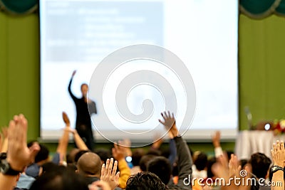 Blurred of rear view Audience in conference hall or seminar room. Speaker are brainstorming, motivational speech at Stock Photo