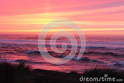 Blurred sunset with vibrant pink, yellow and purple Stock Photo