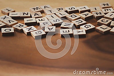 Blurred Text dice cube background. abstract blur. Text dice cube concept / Letter dices alphabet on wooden background. Block of Editorial Stock Photo