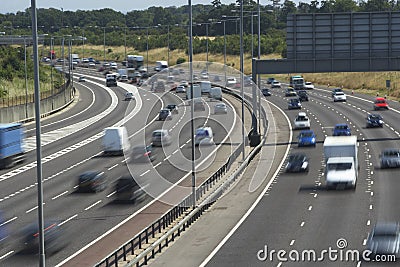 Blurred Traffic On A Busy Highway Stock Photo