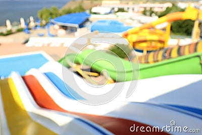 Blurred view from slides in water park Stock Photo