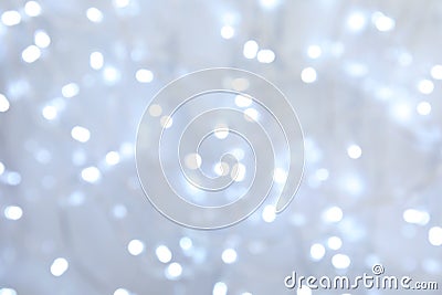 Blurred view of Christmas lights as background Stock Photo