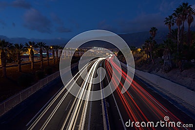 Blurry abstract photo of the lights of cars on the highway Stock Photo