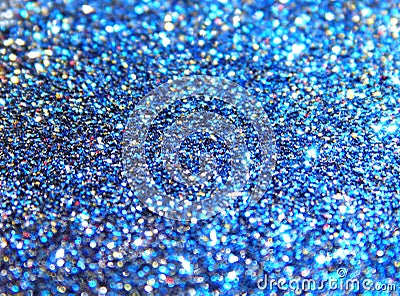 Blurry background of blue, black, golden and red glitter sparkle Stock Photo