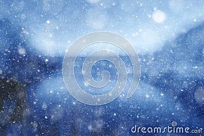 Blurry blue background with snow texture Stock Photo