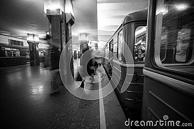 Blurry people upcomig to the Heroiv Dnipra station platform. Underground Metropolitan Editorial Stock Photo