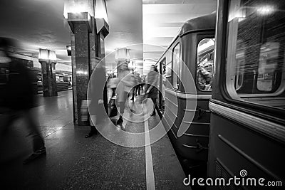 Blurry people upcomig to the Heroiv Dnipra station platform. Underground Metropolitan Editorial Stock Photo