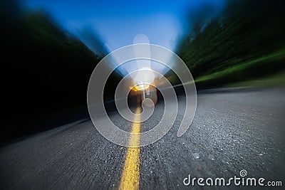 Blurry Road at Night. Drunk Driving, Speeding or Being too Tired Stock Photo