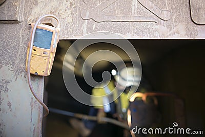 Blurry rope access miner working inside the confined space Stock Photo