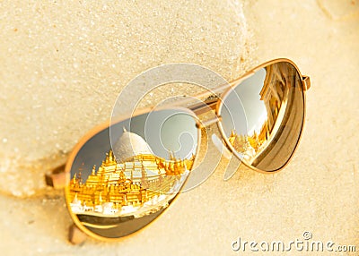 Blurry Sunglasses reflect old pagoda Bagan city Stock Photo