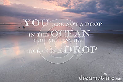 Blurry sunset on the beach with Inspirational quote You are not a drop in the ocean you are entire ocean in a drop Stock Photo