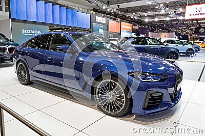BMW Alpina B4 Gran Coupe car at the Brussels Autosalon European Motor Show. Brussels, Belgium - January 13, 2023 Editorial Stock Photo