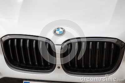 BMW car logo grill close up sign text brand front suv white car exterior detail Editorial Stock Photo