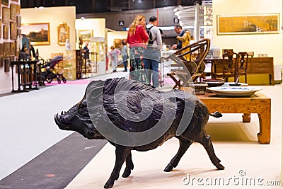 Boar statue at Antik Passion Almoneda 2023 fair at IFEMA Madrid, Spain Editorial Stock Photo
