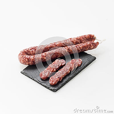 Board with delicious sausage Stock Photo