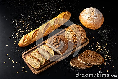board with different breads with floating isolated on black background, HDR image - generated by ai Stock Photo