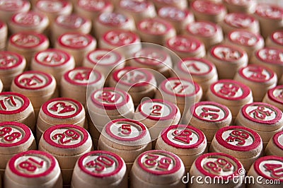 Board game lotto. Wooden lotto barrels for a game lotto. Group intertainment, family leisure. Vintage game. Passion and luck. Stock Photo