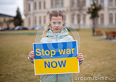 Board No war, Stop war. Little Ukrainian patriot. Ukrainian geopolitics globe crisis Stock Photo