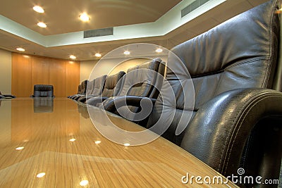 Board room table in conference room Stock Photo