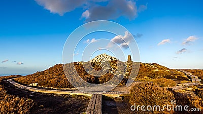 Board walk and monument in Wicklow mountains , sunset, Ireland Stock Photo