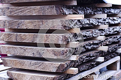 Boards in stacks. Drying walnut. Sawmill, Board. Texture elements. Wood texture. Stock Photo
