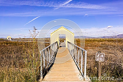 Boardwalk across marshland, Alviso Marina County Park, south San Francisco bay, San Jose, Santa Clara County, California Stock Photo